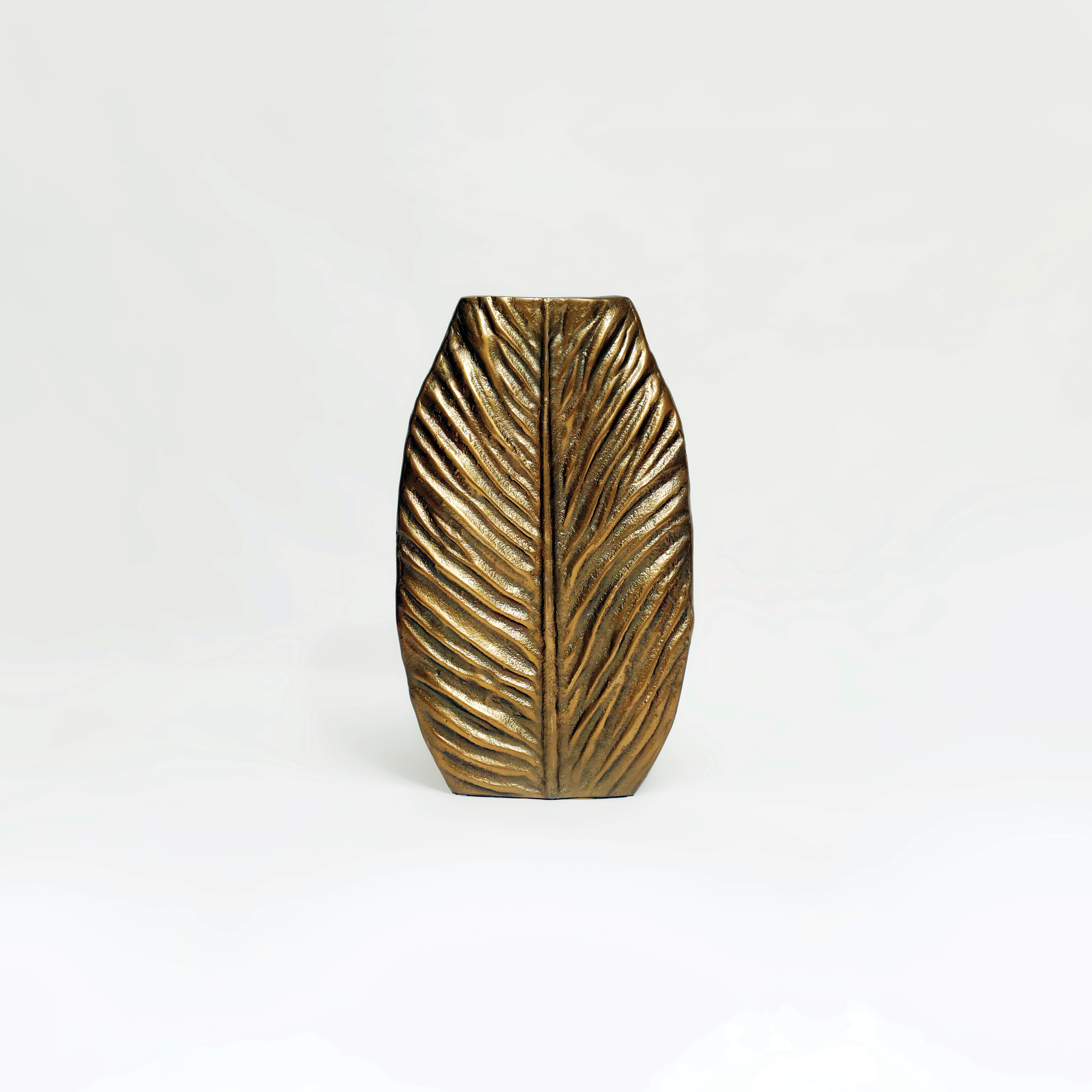 Nexus: An Ornate Leaf Vein Golden Metal Vase in Neoclassical style - Where Symmetrical Grandeur Embraces Natural Detail.
