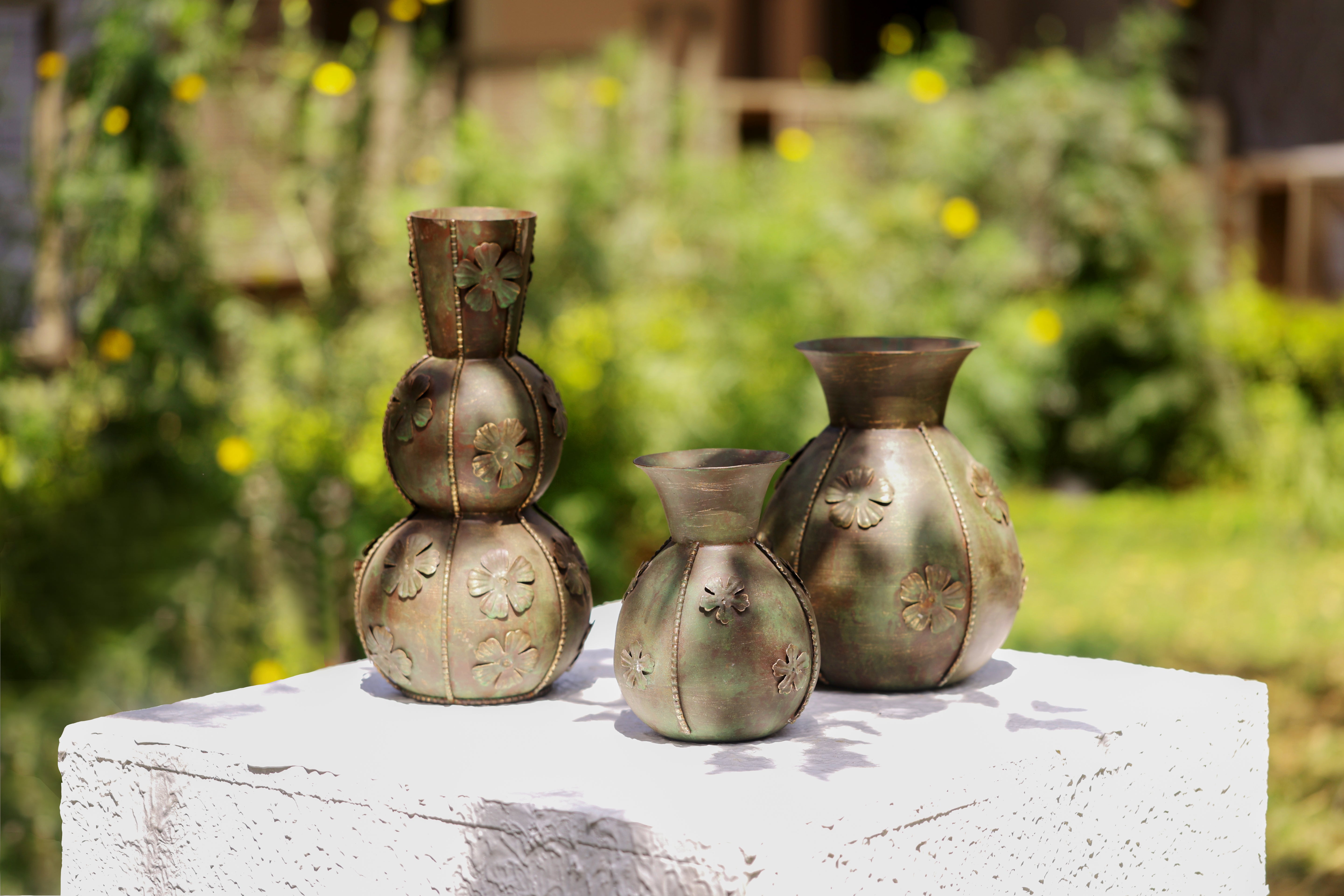 The Trio Tribe: An antique finish ornate floral Vintage metal vase (Set of 3)