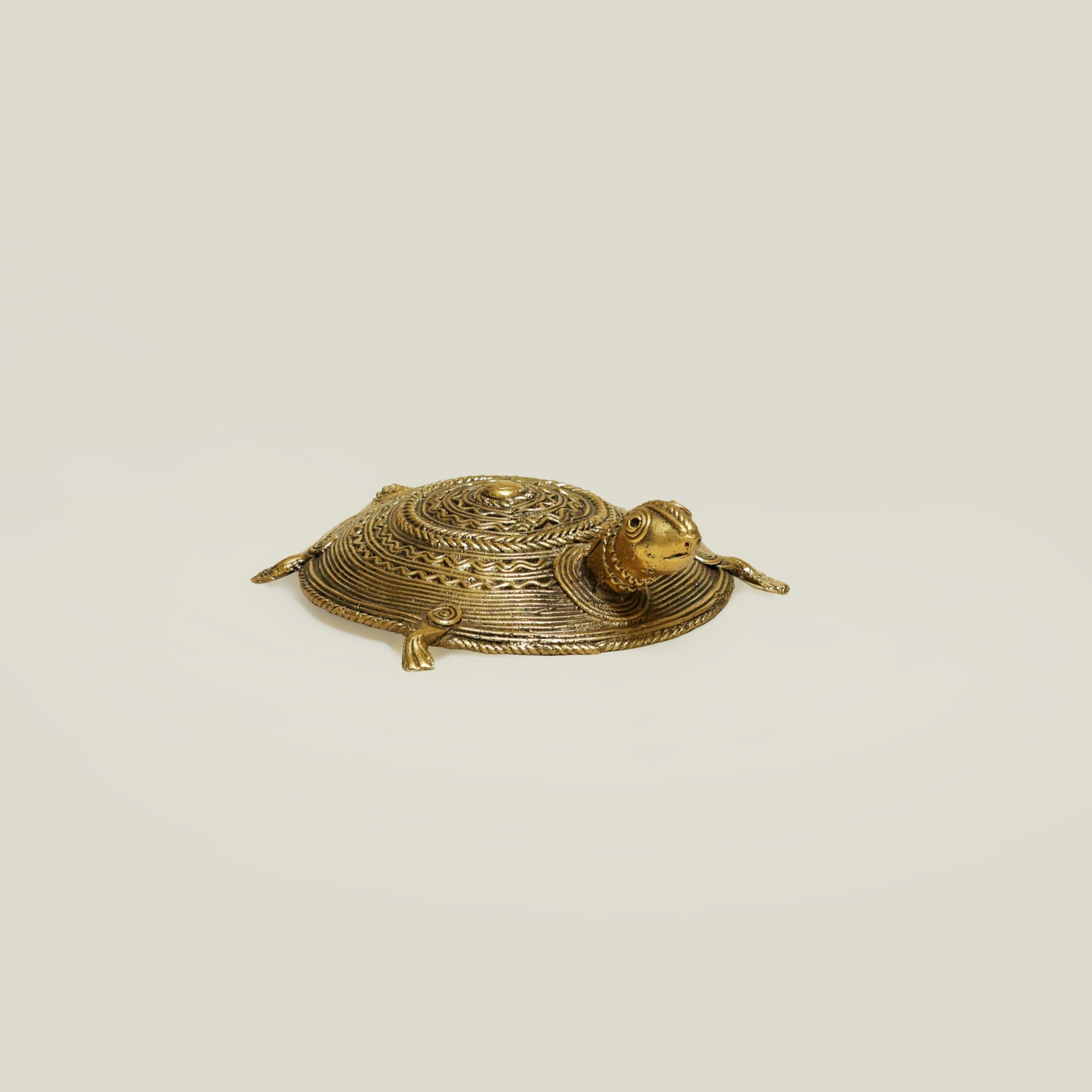 Serene Shell: A Dhokra Brass Forest Sculpture